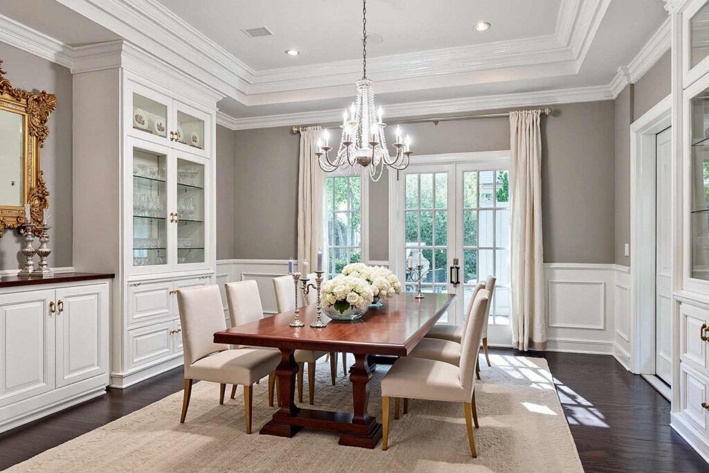 Formal Dining Room With Gray Walls and White Cabinets, painting cabinets ideas, ideas for painting cabinets, house painting ideas, Interior Color Schemes, Cabinet Painting Tips and Tricks, Refinishing Old Cabinets with Paint, Modern Cabinet Painting Ideas, Cabinet Paint Colors