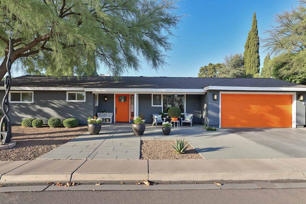 Contemporary Ranch Home With Gray Walls White Trim and Bright Orange Doors, Outdoor home painting, exterior house painting, Home exterior painting, Outside house painting, External home painting, House exterior painting, Residential exterior painting, Facade painting, Exterior wall painting, Outdoor color schemes, External house color concepts, Outside painting inspiration, Home exterior color suggestions, Outdoor paint design concepts, External color combinations, House facade color ideas, Residential exterior colors, Street view attractiveness, Home exterior aesthetics, Outside home appearance, External home charm, Property visual appeal, Front-facing attractiveness, Home facade enhancement, First impression enhancement, Home color inspiration, Residential paint concepts, House color motivation, Home exterior design ideas, Painting design stimulus, Residential color concepts, Home exterior vision, Property painting concepts