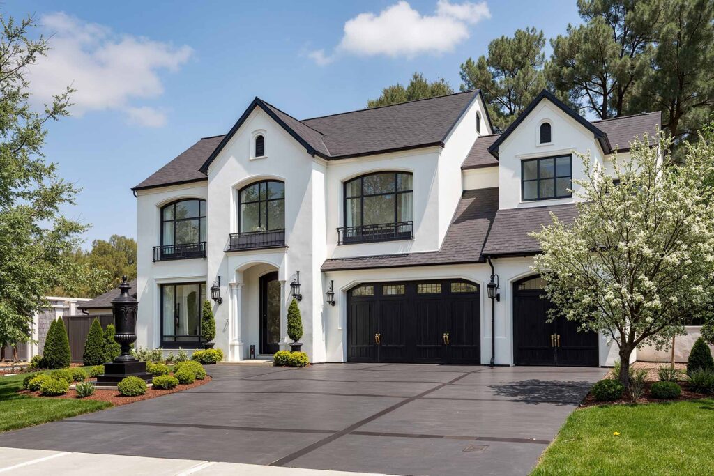 Grand Colonial Estate with Ivory White Walls Onyx Black Trim and Architectural Detail, home exterior color ideas, exterior color coordination, exterior color pattern, exterior color consultation, exterior color inspiration, Exterior Color Schemes That Transform Your Home's Look, House Colors That Create Luxury Appeal, Unexpected Exterior Color Ideas, Exterior Home Painting Techniques for Distinction