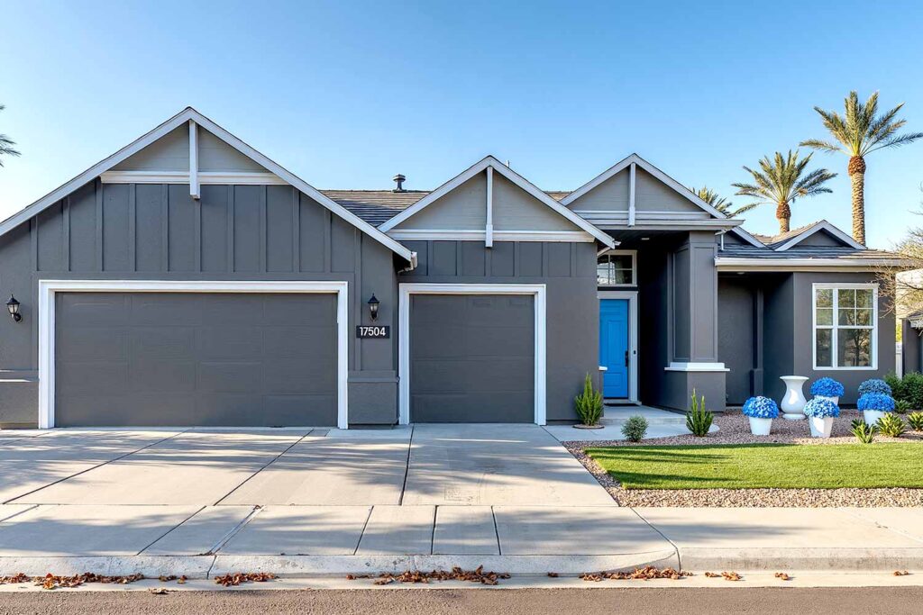 Modern Minimalist House with Deep Charcoal walls and Lighter Charcoal Gray Accent Wall, exterior house colors, home exterior painting, exterior color ideas, exterior home painting, tone-on-tone color schemes, curb appeal, architectural style, accent walls, body color, accent shade, trim color, front door color, tone-on-tone exterior, architectural details, color family, exterior transformation, layered colors, exterior color stories, exterior color palettes, exterior color combinations, home color schemes, exterior painting project, exterior painting transformation, exterior color application, layered shades, different shades within the same color family, subtle shifts, tonal shifts, color progression