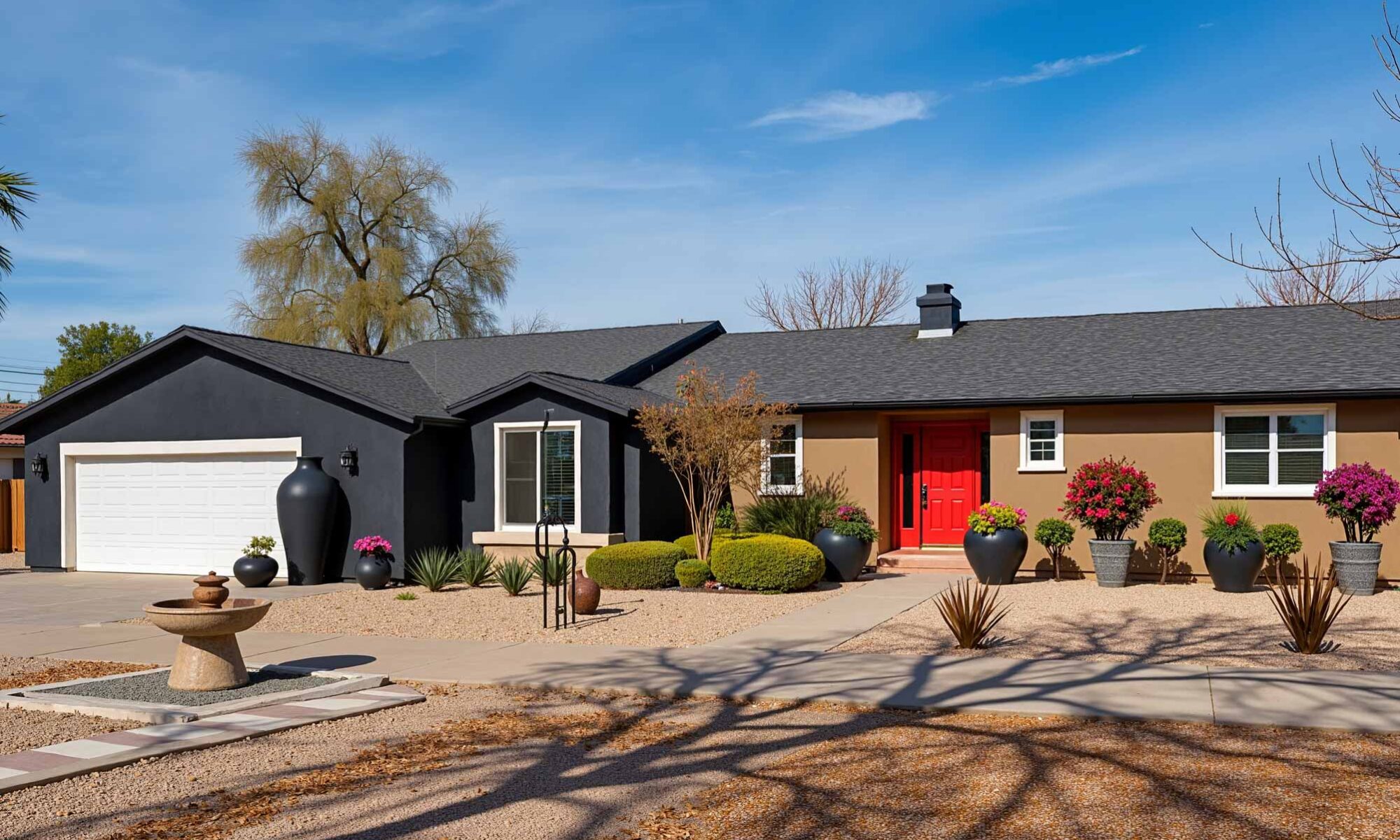 Ranch Home with Taupe Walls Deep Charcoal Accent Walls and Red Door, ranch house color scheme, ranch house colors, Exterior color ideas, House painting inspiration, Two-tone color scheme, Ranch architecture, ranch style, ranch home, ranch silhouette, Color combination, color palette, color pairing, color expression, Exterior Facade, outdoor, outside surface, exterior walls, Modern, Contemporary, current, updated, fresh, Transformation, Makeover, reimagining, updating, refreshing,
