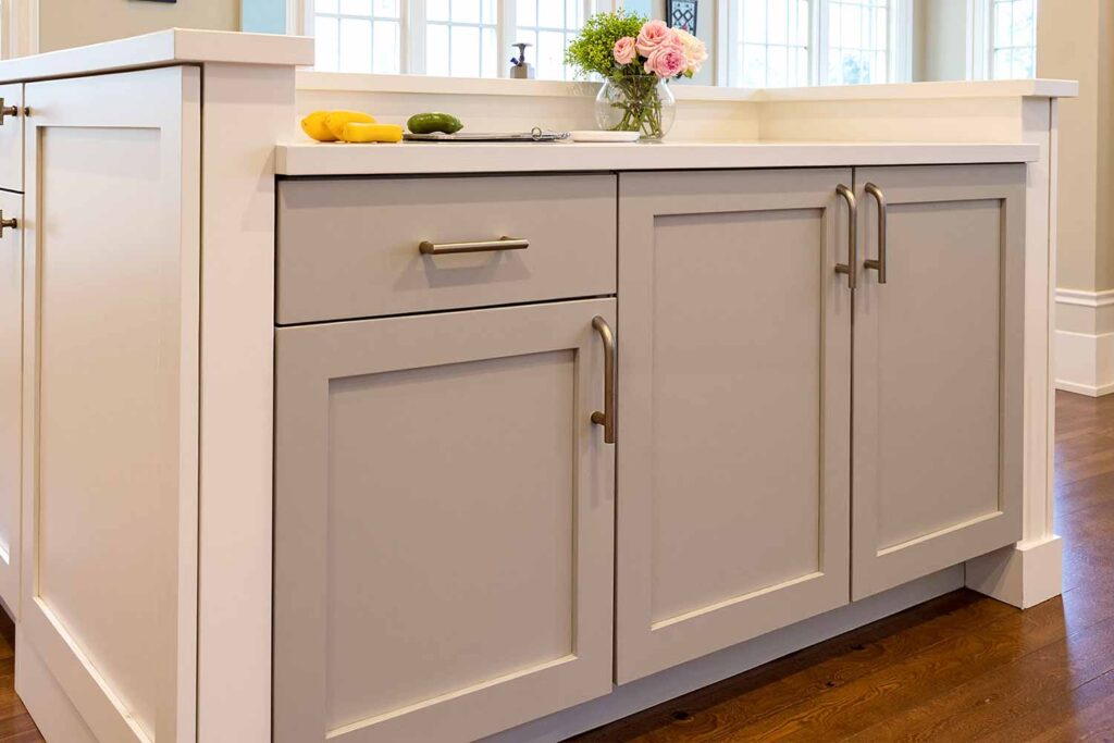 Modern Two-Tone Kitchen Cabinets Painted In Off White and Taupe, Cabinet accent painting, Specialty cabinet finishes, Bold cabinet graphics, Cabinet mural designs, Artistic cabinet treatments, Contemporary cabinet art, Cabinet stencil painting, Color-blocked cabinets, Linear cabinet designs, Cabinet makeover ideas, Kitchen cabinet striping, Cabinet feature painting, Unique cabinet finishes, Statement cabinet art, Transformative cabinet painting, Painted kitchen accents, Cabinet surface design, Decorative kitchen makeovers, Modern kitchen pattern painting