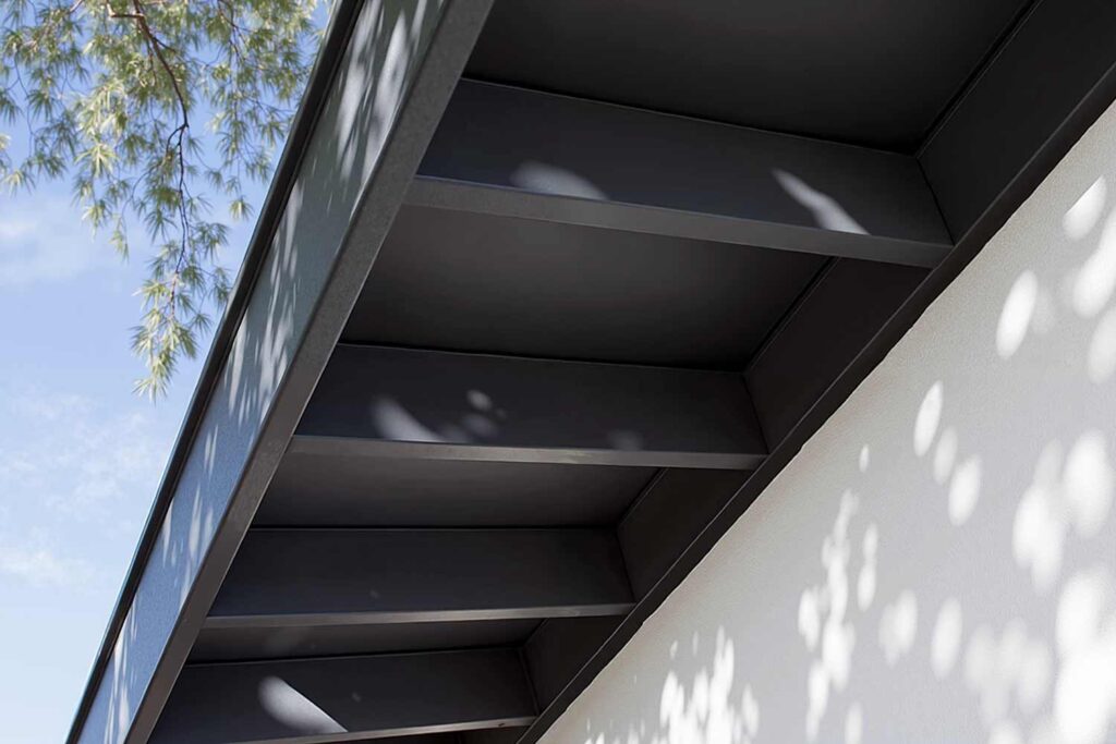 Scottsdale House With Bright White Walls and Matte Black Fascia and Eaves, soffit and fascia color schemes, trending eave paint colors, contemporary eave color choices, modern eaves color schemes, house painting exterior