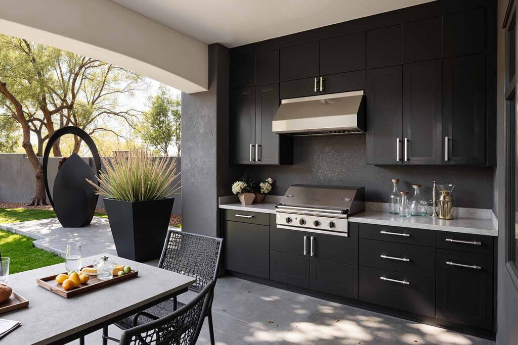 Ultra-Modern Home With Black Outdoor Kitchen Cabinets, deck kitchen cabinet finishes, how to choose outdoor kitchen cabinet colors, coordinating patio cabinet colors with house exterior, best paint for outdoor kitchen cabinets, weatherproof cabinet color ideas, matching trim colors with outdoor cabinets, exterior cabinet and ceiling color combinations, durable paint for outdoor cabinetry, personality-expressing patio cabinet colors