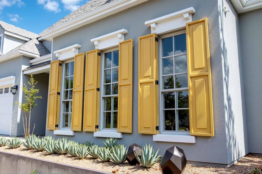 Gray Arcadia Home with Mustard Yellow Ochre Shutters and White Trim, shutter color ideas, shutter colors, shutter paint colors, shutter color trends, shutter color combinations, window shutter hues, painting shutters, Phoenix painter