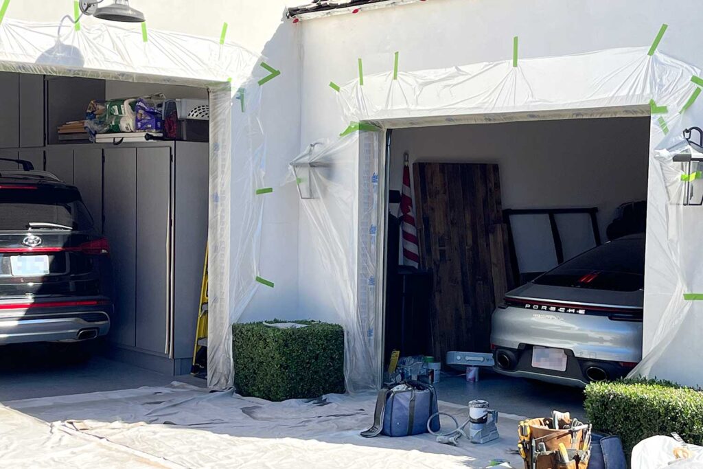 Prepping garage for painting, painting the exterior of a house