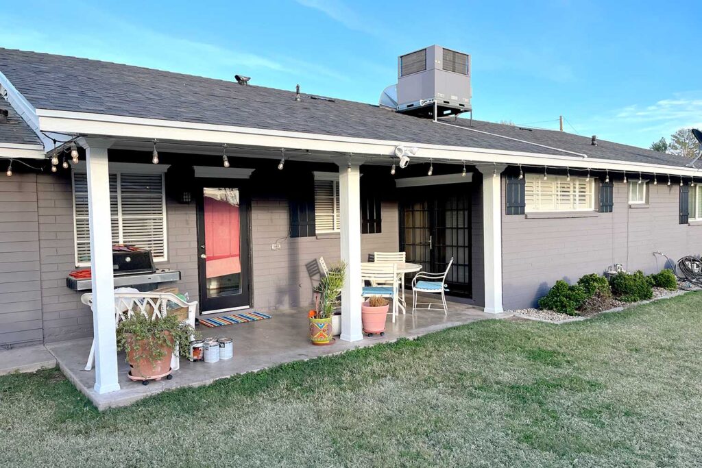 back patio of a Phoenix Arcadia home, Giving your brick house a fresh coat of paint can transform its appearance and breathe new life into the property, painting brick house