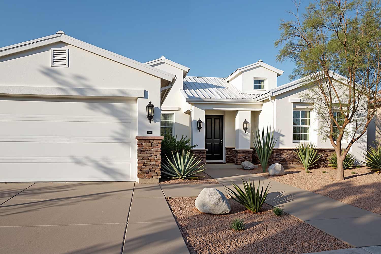 energy efficient house with white walls and white roof, modern home crisp white walls black front door brown stone base desert landscaping Scottsdale morning sunlight driveway with tire marks, white house with rock accent in Phoenix, Arizona, best exterior home painting contractors, Transform Your Home's Curb Appeal with one of the Best Exterior Painting Contractors in Phoenix, best exterior painting contractors, exterior painting contractor near me, exterior painting contractors near me, exterior paint contractor near me, exterior paint contractors near me, exterior painting company near me, exterior house painting contractors, exterior home painting contractors, exterior painting contractor, exterior painting contractors, exterior paint contractors, Phoenix, Scottsdale, Arcadia