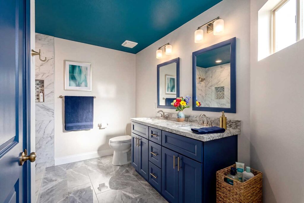 Bathroom with Deep Teal Ceiling Soft Pearl Walls and Navy Blue Accents-4, painting the fifth wall, Fifth wall painting ideas, Designing the fifth wall, Fifth wall color application, Accenting the fifth wall, Transforming the fifth wall