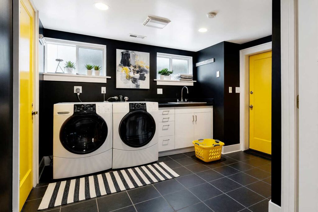 Graphic Laundry Room with Black Walls Yellow Door and White Trim-4, laundry room paint colors, laundry room color schemes, laundry room color palettes, paint colors for laundry rooms, best colors for laundry rooms, washroom paint colors, laundry space hues, laundry room paint shades