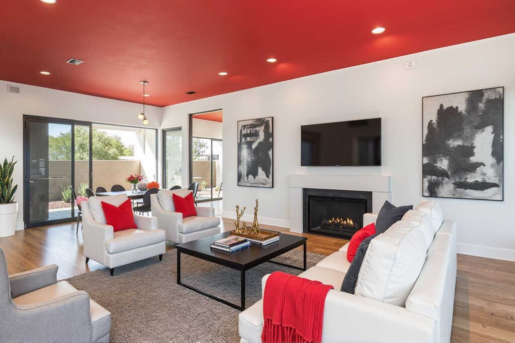 Living Room with Saturated Red Ceiling White Walls and Charcoal Gray Accents-1, painting interior ceilings, Indoor ceiling painting, Painting inside ceilings, Interior ceiling color ideas, Painting room ceilings, Updating interior ceilings with paint