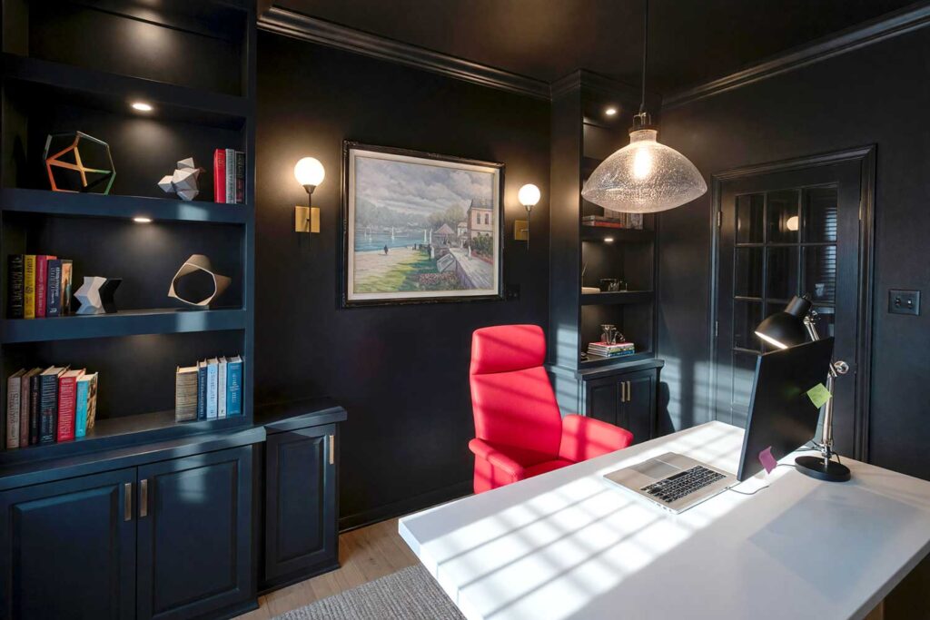 Sleek Deep Charcoal Home Office with Light Maple Floors and Red Chair-9, color drenching interior paint, immersive interior color, all-over interior paint, enveloping color scheme, single-hue room design, full-room color saturation, unified color interior, total surface paint treatment