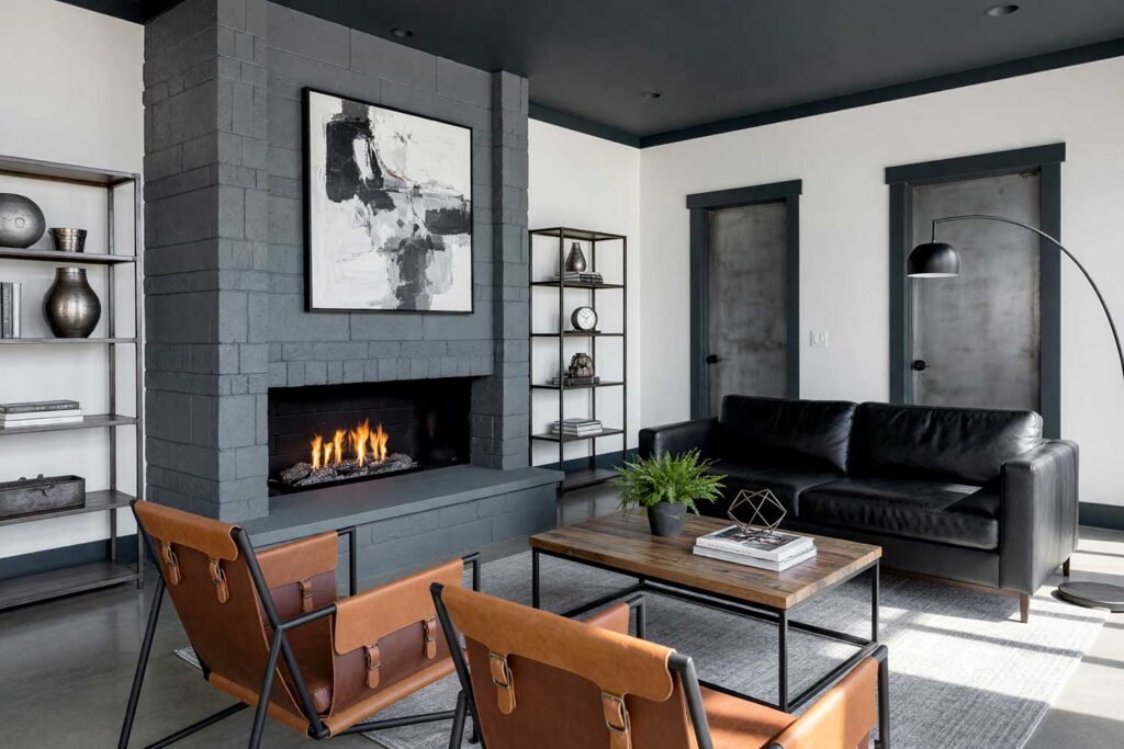 Modern Industrial Living Room with Slate Grey Fireplace and Icy White Walls-2, indoor brick fireplace makeover, living room fireplace transformation, painted fireplace renovation, modernizing outdated brick fireplaces, updating 1970s brick fireplace, updating ugly brick fireplace, contemporary fireplace makeover, reviving old brick fireplaces, painted stone fireplace ideas, updating a stone fireplace, painted river rock fireplace, stone fireplace color transformations, painted faux stone fireplace, whitewashed brick fireplace ideas, limewash fireplace inspiration