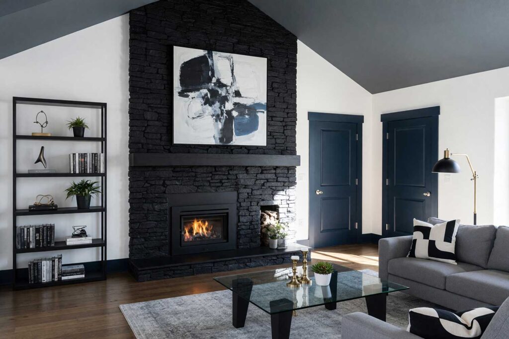 Modern Living Room with Matte Black Brick Fireplace and Stark White Walls-2, painting interior brick fireplace, painted living room brick fireplace ideas, painted indoor brick fireplace, interior fireplace painting ideas, painted masonry fireplace, painted fireplace surround, painted brick fireplace inspiration, living room fireplace color ideas, painted fireplace designs, modern painted brick fireplace, painted fireplace before and after, fireplace makeover ideas, indoor brick fireplace upgrade, updating interior brick fireplace
