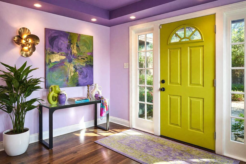 Art House Entry Foyer with Iced Violet Walls and Chartreuse Door-4, art house entry foyer featuring iced violet walls chartreuse door cool soft white trim and deep amethyst ceiling in a freshly painted Scottsdale neighborhood home. bold decor includes black console table abstract vases brass candlestick and a patterned area rug illuminated by strong morning sunlight casting sharp shadows and bright highlights creating a vibrant and creative entrance, moody color, accent wall, accent ceiling, painted ceiling, tone-on-tone, bold color contrast, color palette, coordinating colors