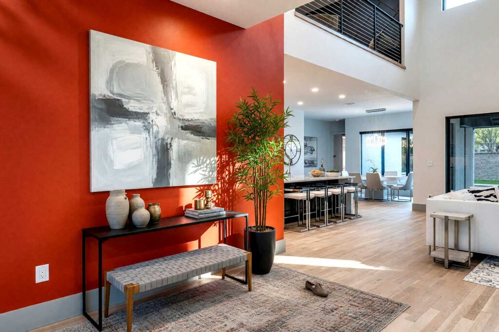 Dramatic Foyer with Vermillion Walls Soft Pewter Door and Matte Charcoal Trim-1, dramatic foyer with vermillion walls soft pewter gray door matte charcoal trim and paper white ceiling modern japanese-inspired decor in a scottsdale neighborhood strong sunlight highlights bold architectural details, moody color, accent wall, accent ceiling, painted ceiling, tone-on-tone, bold color contrast, color palette, coordinating colors