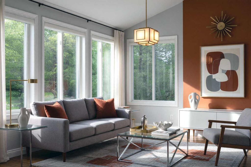 Mid-Century Modern Sunroom with Gray Walls and Burnt Sienna Accent Wall-3, sleek mid-century modern sunroom dove gray walls burnt sienna accent wall crisp white trim walnut hardwood floors scottsdale neighborhood. A stylish sunroom in a Scottsdale neighborhood featuring dove gray walls and ceiling with a burnt sienna accent wall. The space includes a streamlined sofa with tapered wooden legs, a white low credenza, and a starburst wall clock. Bright afternoon sunlight creates dramatic shadows and highlights, evoking a confident retro mid-century modern retreat. sunroom paint colors, arizona room color scheme, sunroom color scheme, sunroom color palette, sunroom colors, arizona room paint colors, arizona room paint scheme, sunroom paint ideas