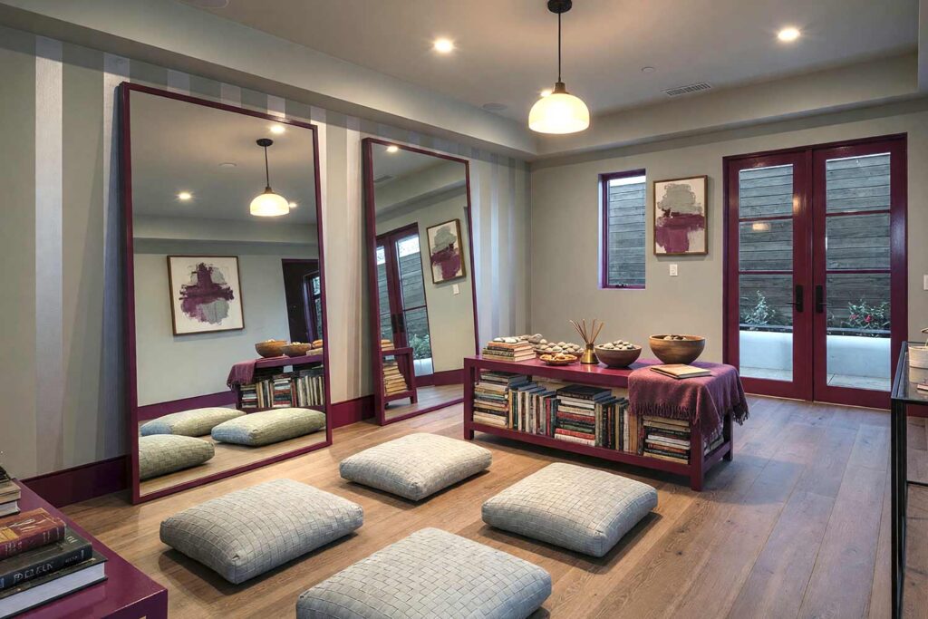 Moody Meditation Studio with Aubergine Trim and Silver Sage Striped Accent Wall, moody meditation studio aubergine silver sage striped accent wall silver sage walls soft dove gray ceiling aubergine trim. A serene Scottsdale neighborhood meditation space featuring aubergine and silver sage vertical stripes, woven floor cushions, and unglazed ceramic bowls. The dim pendant light and sandalwood incense create a hushed, contemplative atmosphere perfect for yoga and mindfulness practice. bold striped wall paint, two-color striped walls, painting a striped wall, vertical striped wall paint, horizontal striped wall paint, multicolor wall stripes, custom painted stripes