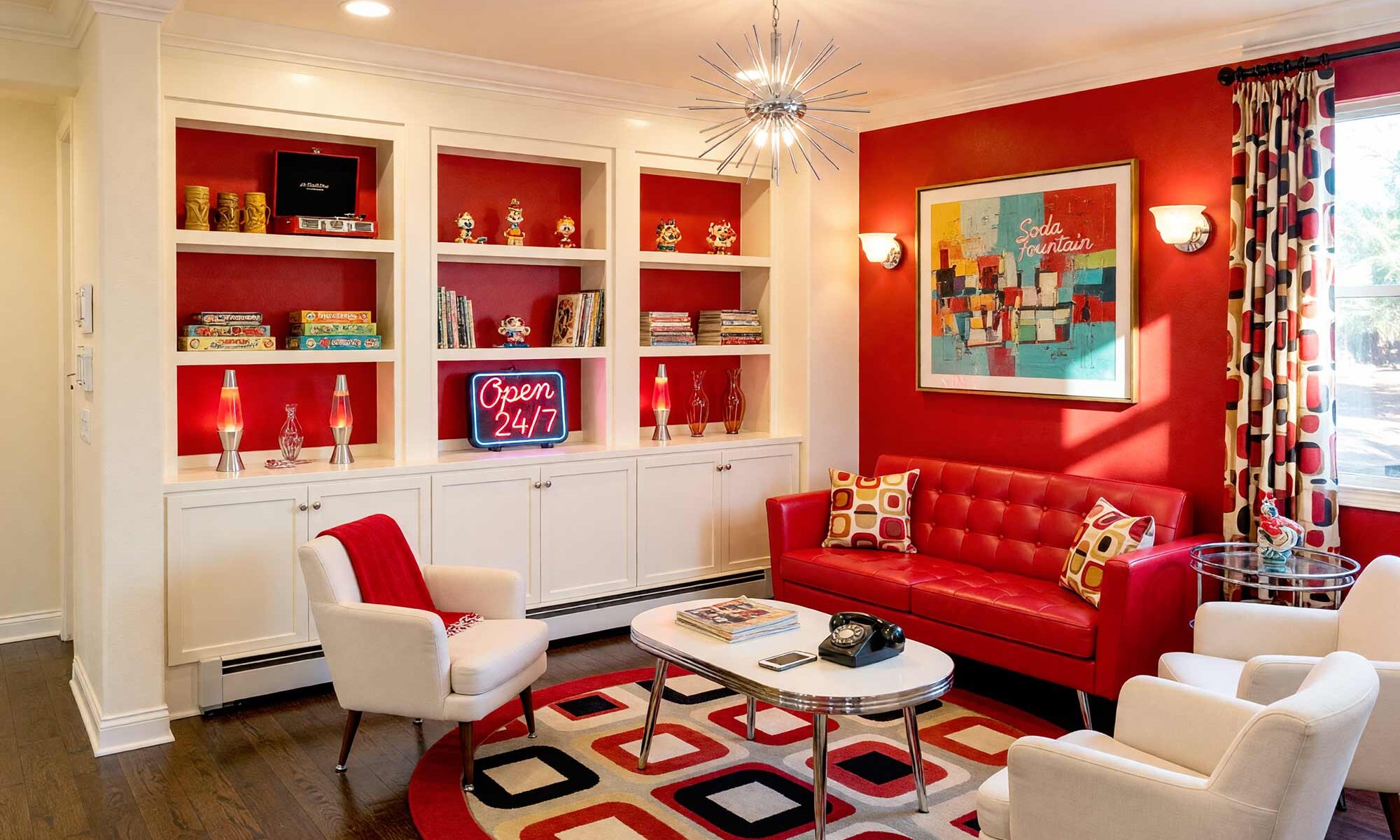 Retro Diner-Inspired Living Room with Cherry Red Accent Wall and Soft Cream Shelving-4-FEATURE, retro living room with cherry red accent wall soft cream shelving chrome trim and dark oak flooring. A vibrant 1950s-inspired living room in a Scottsdale neighborhood featuring a tufted cherry red vinyl sofa, kidney-shaped coffee table, and retro bar cart. Built-in shelving showcases vintage board games, tiki mugs, and a chrome-edged record player, while a starburst chandelier and bold geometric rug complete the nostalgic diner-style aesthetic. Bright morning sunlight casts dramatic shadows, enhancing the playful, glossy look of this charming mid-century space. Bookshelf paint color ideas, Painting built-in bookshelves, Color ideas for painting bookshelves, Built-in bookcase design ideas, Ideas for painting built-in shelves, Built-in bookshelf color inspiration, Bookcase paint colors