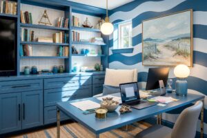Striped Home Office with Steel Blue and Denim Blue Accent Waves-3-FEATURE, wavy coastal home office steel blue walls denim blue accent waves bright white ceiling. A serene Scottsdale neighborhood workspace featuring a denim blue desk, nautical-themed art, floating shelves with sea-inspired decor, and a jute rug with coastal patterns. The wavy accent wall adds motion and calmness, while the bright white ceiling enhances the airy, fresh feel. painting striped walls, painting wall stripes, painted wall stripes, two tone striped walls, painting striped accent walls, striped wall paint ideas, painted stripe walls
