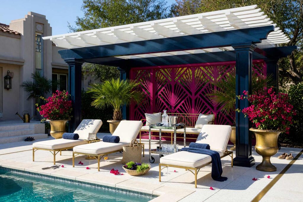 Art Deco Poolside Pergola with Navy Posts and Magenta Screen-5, art deco poolside pergola midnight navy chalk white slats deep magenta trellis pergola paint colors. Located at a custom Scottsdale residence, this glamorous shade pergola combines semi-gloss midnight navy posts with chalk white slats and an Art Deco deep magenta trellis. Polished terrazzo, a mirrored bar cart, and pool reflections complete an opulent retreat beneath dramatic late-afternoon shadows. pergola paint colors, painted pergola ideas, painting an outdoor pergola, painting backyard ramada, pergola color ideas, pergola color schemes, what color to paint a pergola