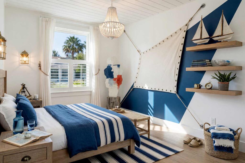 Bedroom with White Walls and Blue Painted Wedge and Grommeted Sailcloth-5, coastal guest bedroom salt white walls maritime aegean wedge sailcloth canvas whisper white baseboards oak floors painting creative wall treatments. A coastal vacation suite in a Scottsdale neighborhood featuring a white oak platform bed with rumpled Aegean blue linens, a woven rattan bench, brass cage sconces, and an authentic grommeted sailcloth canvas suspended over a bold blue paint wedge. Intense morning sunlight pours across the bleached oak floors, casting dramatic shadows and illuminating the shiny whisper white woodwork. painting creative wall treatments, creative wall treatments, mixed material wall treatments, dimensional painted walls, textured accent wall ideas, metal accent wall ideas
