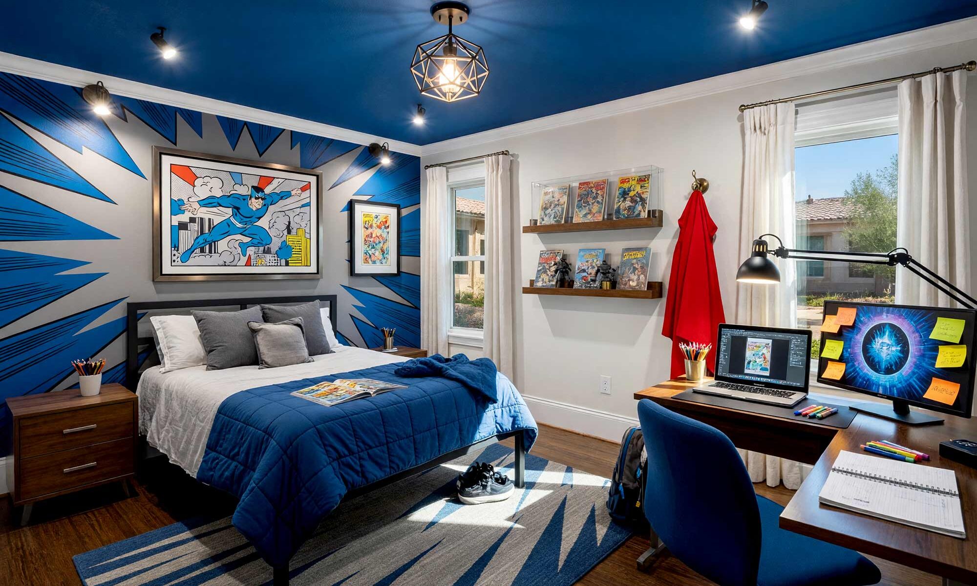 Comic Book Hero Hideout Child’s Bedroom with Royal Blue Ceiling-4-FEATURE, kid’s bedroom paint colors comic book hero soft dune white royal blue smoke gray hickory floor. An aspirational comic book hero child's bedroom in a Scottsdale neighborhood featuring soft dune white walls, an artisan painted speed-line burst with dynamic radiating motion streaks in royal blue and smoke gray, and lustrous cloud white semi-gloss woodwork. The dynamic retreat pairs an unmade blackened steel bed with a functional homework station complete with a dual-screen computer setup, acrylic comic book displays, and a cape hook by the door. Natural hickory flooring and dramatic, high-contrast sunlight create an energetic haven built for academic focus and epic adventures. kids bedroom paint ideas, child's bedroom color palette, kids room paint colors, toddler bedroom paint colors, kids bedroom colors